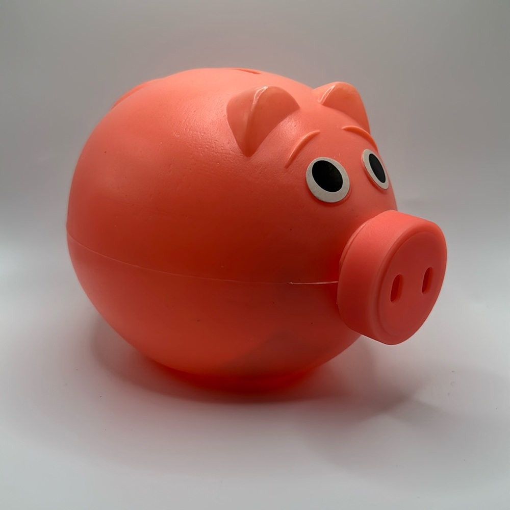 Vintage pink plastic piggy bank